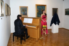 Performing at the opening of exhibition dedicated to the passed away diva Vilma Bukovec at Metlika